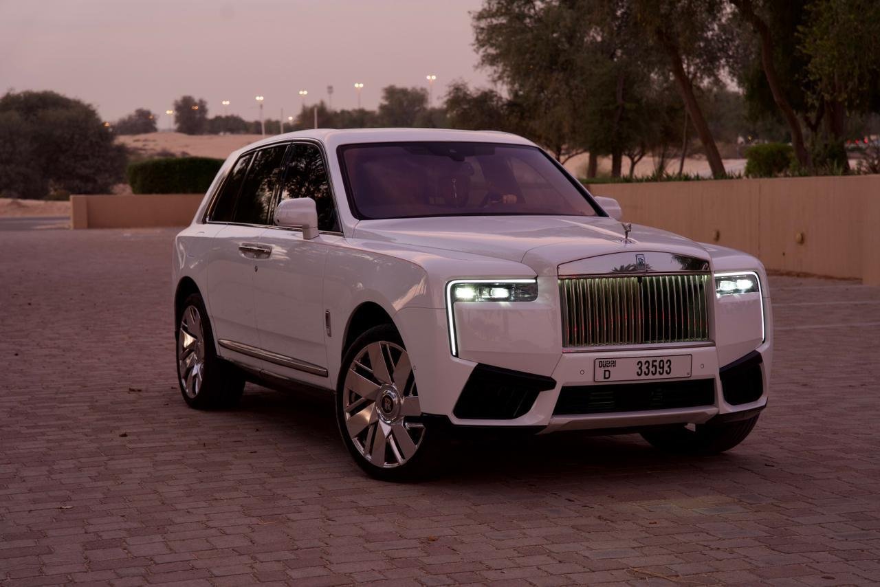 Rolls-Royce Cullinan rental Dubai at dusk — Diamond White, plate D 33593