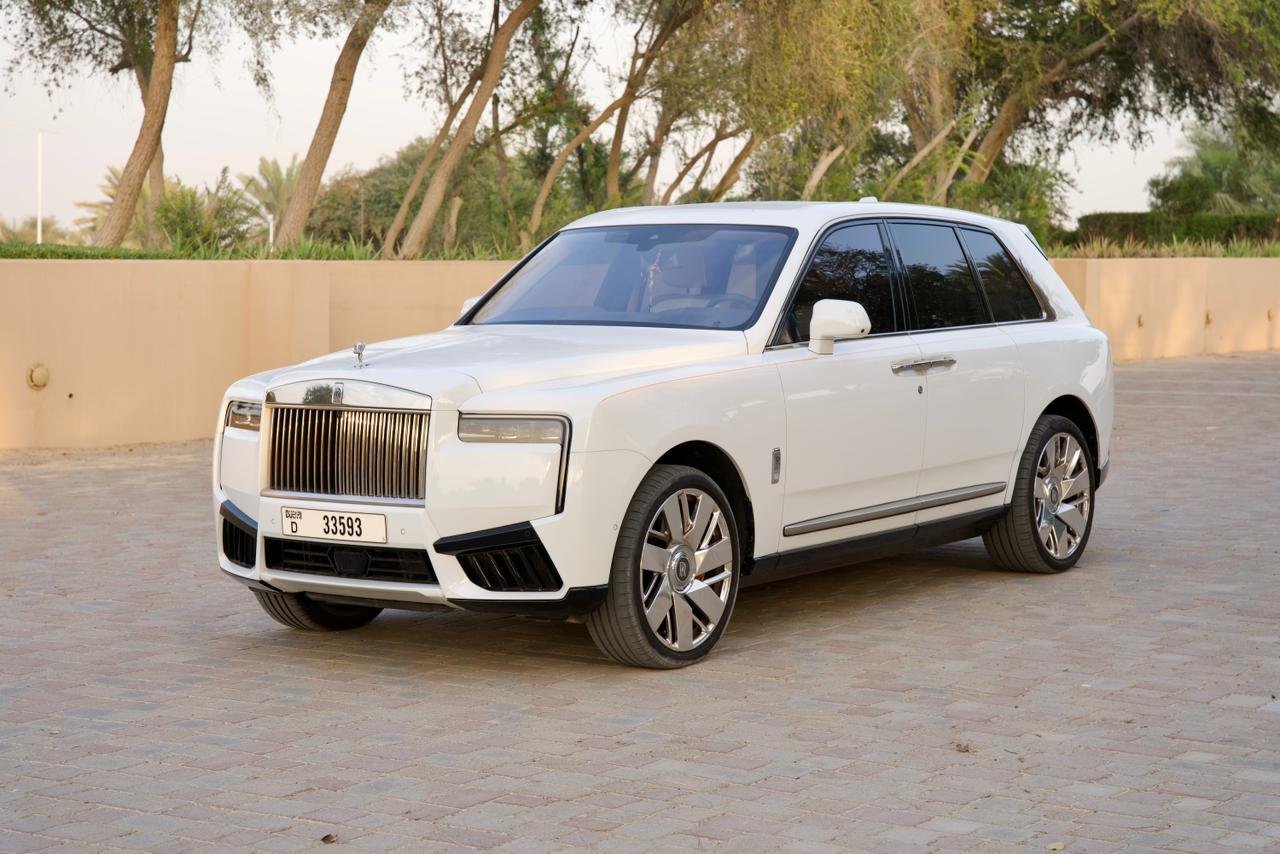 2025 Rolls-Royce Cullinan in Diamond White, plate D 33593, for rent in Dubai from RoadsNGlories
