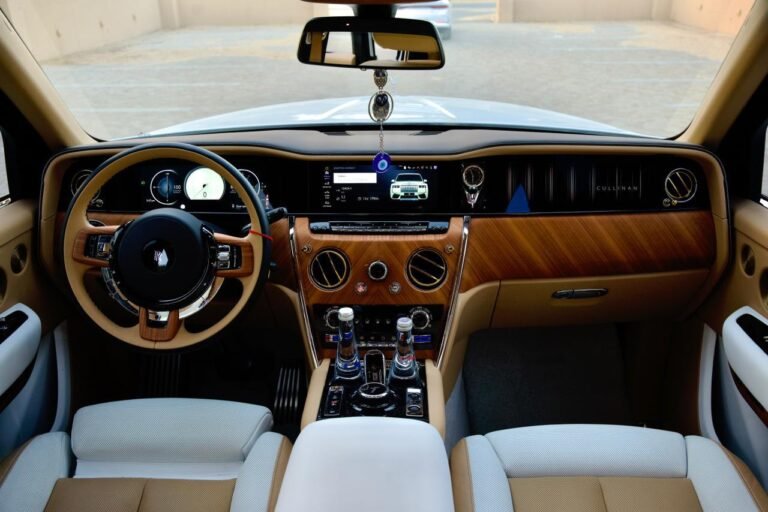 Rolls-Royce Cullinan Art Deco cabin — teak veneer, gold detailing