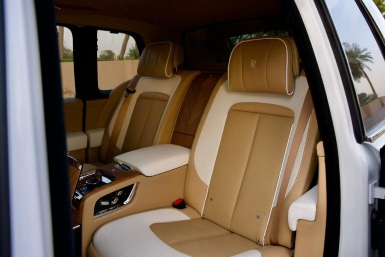 Rolls-Royce Cullinan rear seats — tan and cream hide, four seats